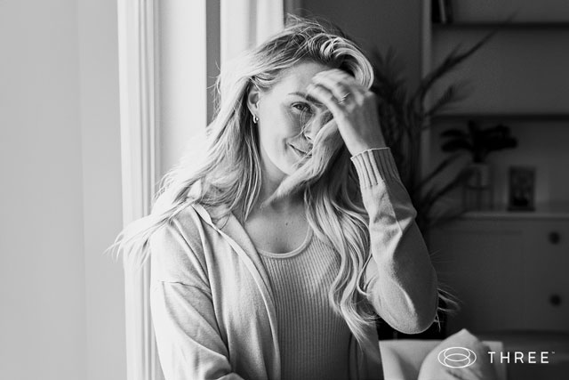 woman running hand through hair